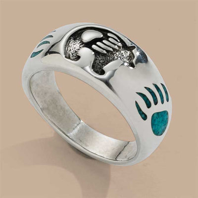 Bear Symbol Ring is hand-crafted in 925 Sterling Silver ring with a Grizzly Bear center with single bear paws, in crushed Kingman Turquoise chip inlay, either side of the Bear